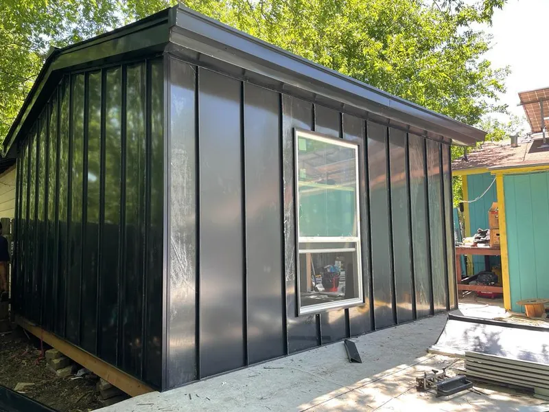 Black standing seam metal wall panels for Metal Roof Installation in West Little River