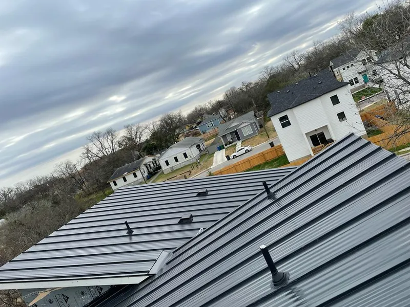 Standing seam metal roof panels with vents for Skylight Repair in West Little River